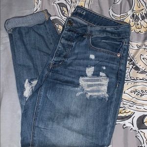 Very distressed American Eagle Tomgirl jeans